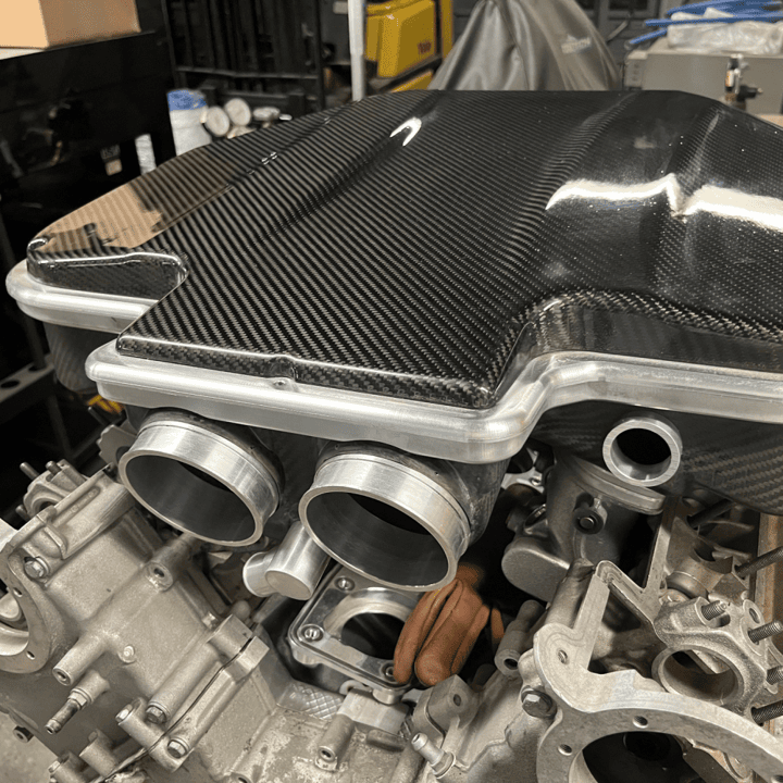 A black carbon fiber intake plenum for the BMW S62